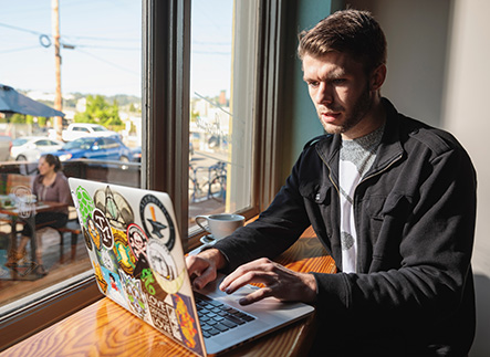 Student studying at her laptop