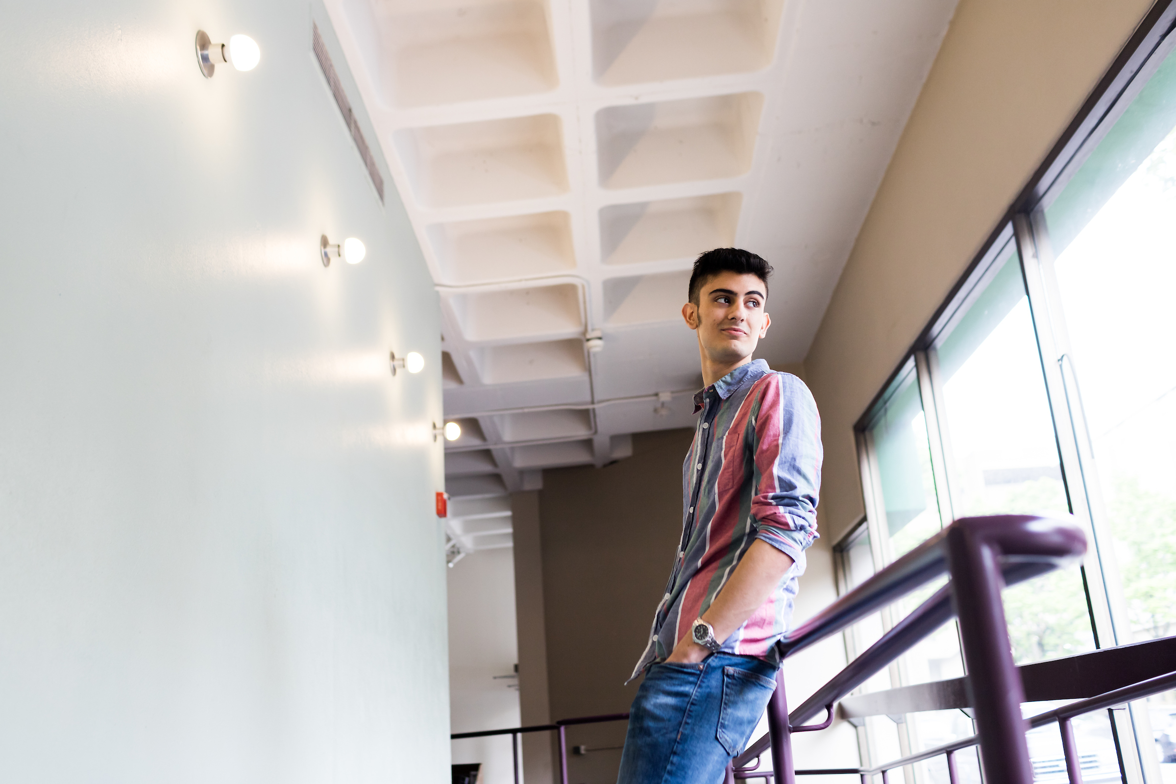 student lounging on campus