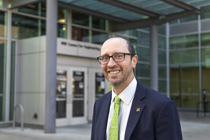Dr. Joseph Bull standing in front of PSU's engineering building
