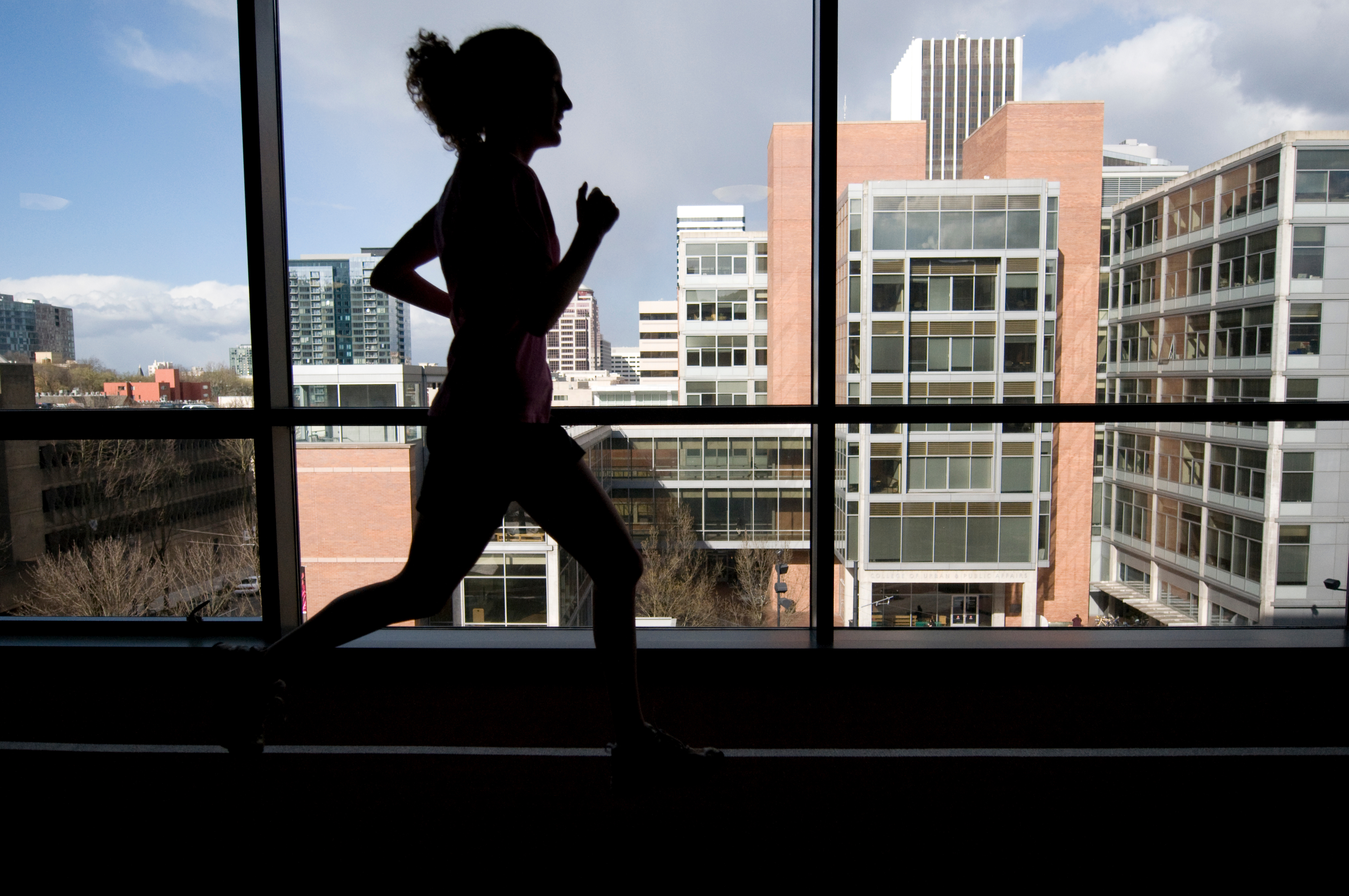 Person Running on Track