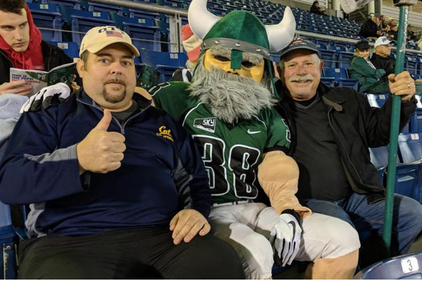 Derek Ott and his father at a Vikings football game
