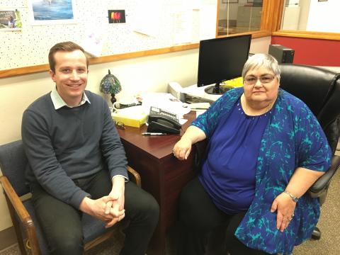 Image of Brian and May together