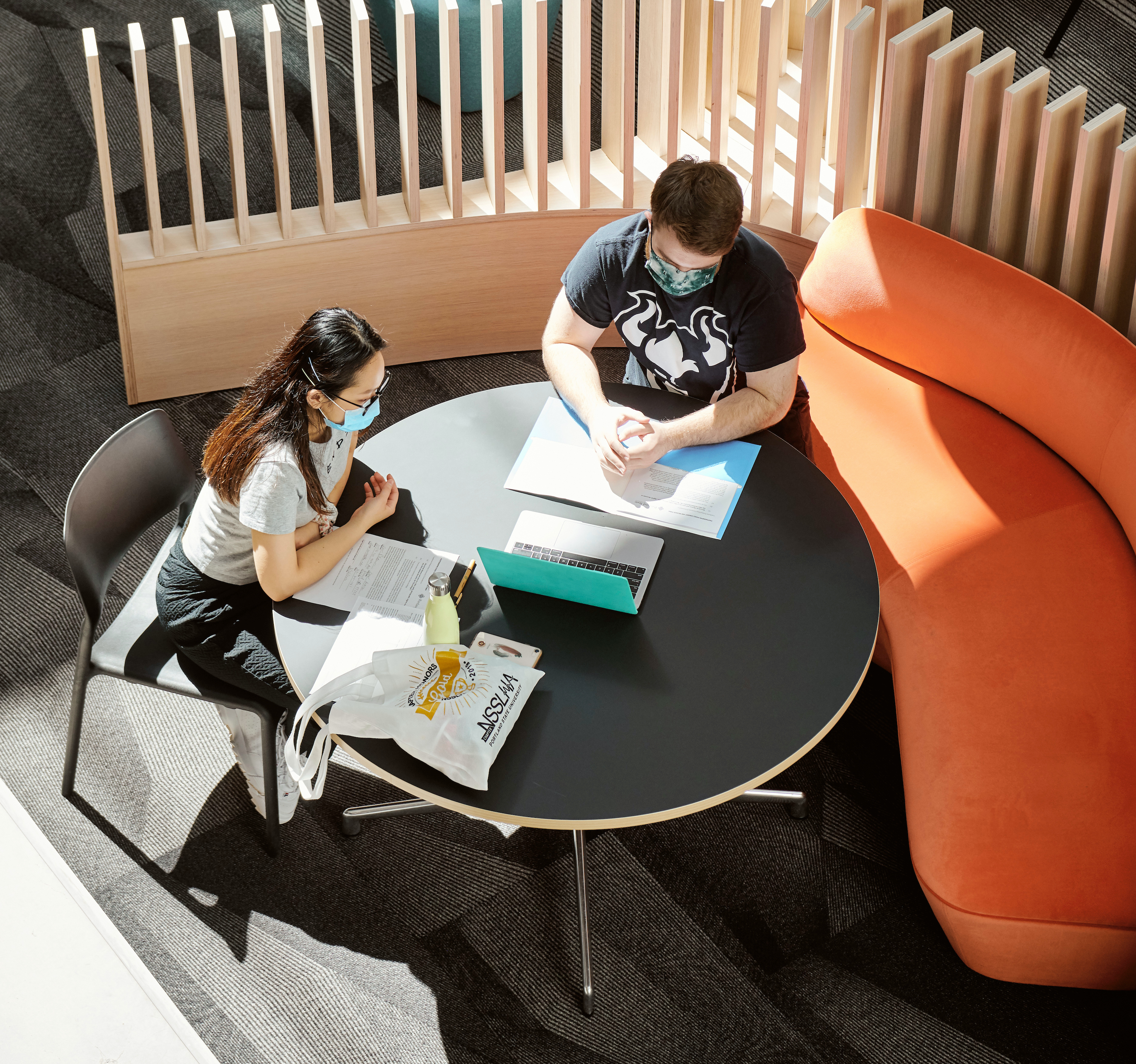 studying together in FMH with masks and snacks